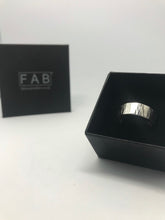 Load image into Gallery viewer, Linear 925 Sterling Silver Textured Handmade Ring Shown In Black FAB Logo Jewellery Box.