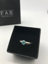 Load image into Gallery viewer, Deep blue Topaz solitaire ring made with a Sterling silver D shaped shank shown inside Eco Friendly jewellery box.