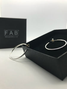 Handmade Hoops Solid Sterling Silver Earrings 2mm Wire medium size, pictured on black Eco Friendly jewellery box.