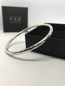 925 Sterling silver handmade bangle glistening on its ECO Friendly box. Made from 4mm diameter solid silver wire.