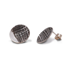 Load image into Gallery viewer, Pair Of Threads Etched Sterling Silver Studs Shown Against Bright White Background.