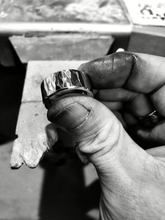 Load image into Gallery viewer, Solo Heavyweight 925 Sterling Silver Handmade Gents Ring In Jewellers Hand With Dirty Fingers.