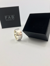 Load image into Gallery viewer, Solo Heavyweight 925 Sterling Silver Handmade Gents Flat Hammered Ring Placed In Front Of FAB Jewellery Box.